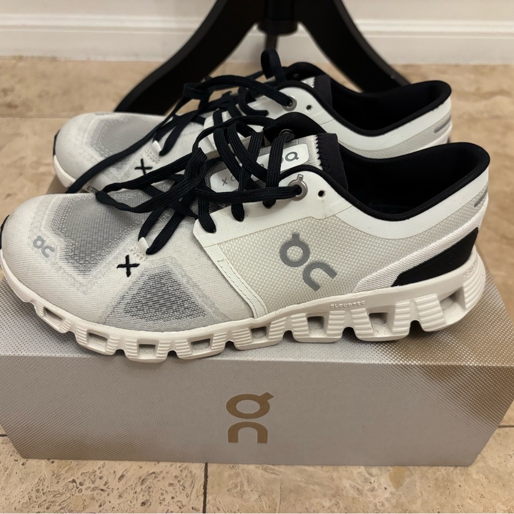 On Running Black and White Athletic Shoes